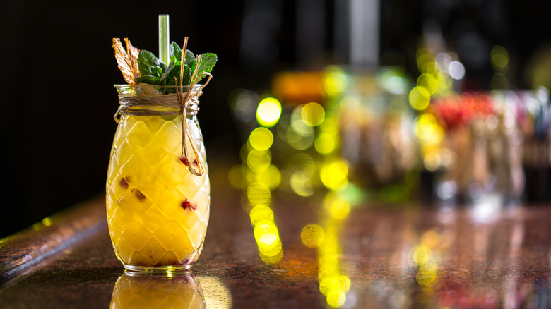 Tropical drink in pineapple glass