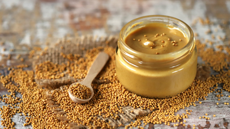 Spicy brown mustard in a jar