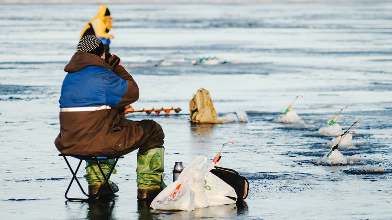 winter fishing on frozen water