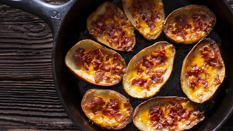 loaded potato skins in skillet