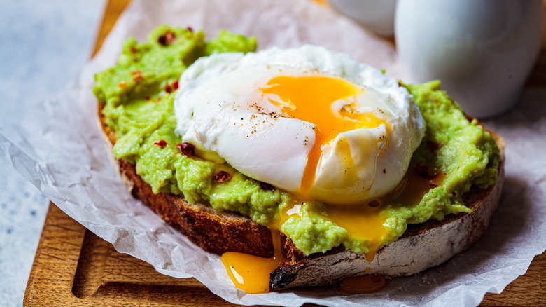 Poached egg on a slice of avocado toast