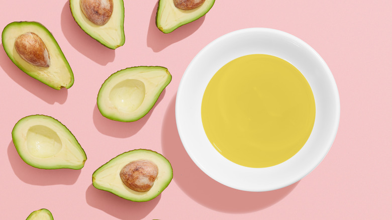 avocados and bowl of oil