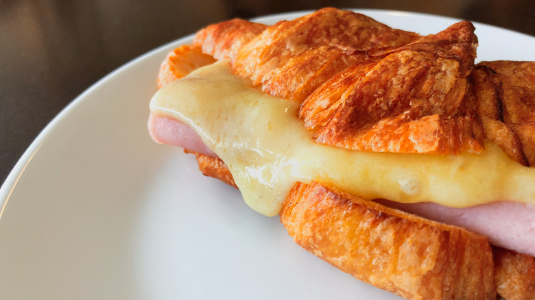 close up of ham and cheese croissant