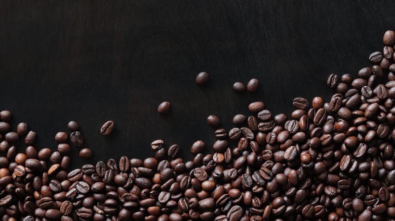 Coffee beans on black background