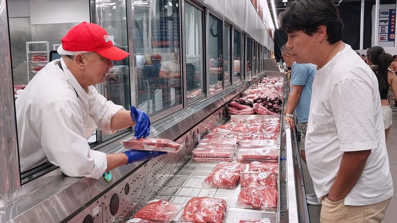 Man in Costco meat department