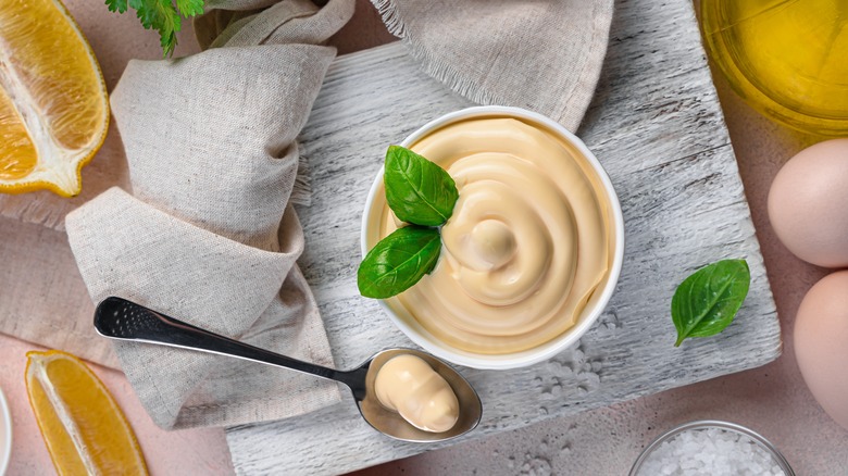 bowl of mayonnaise with basil