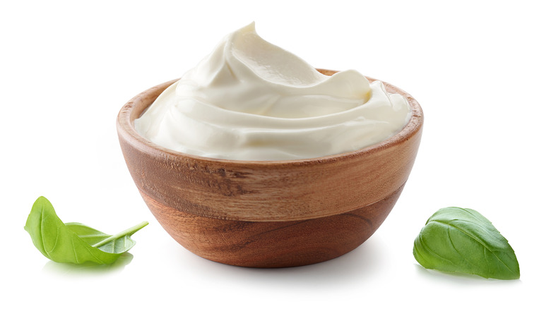 sour cream in wood bowl