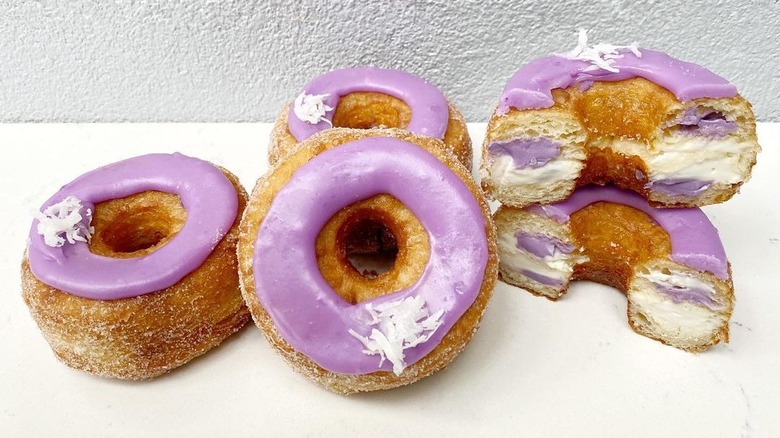 stack of ube and coconut cronuts