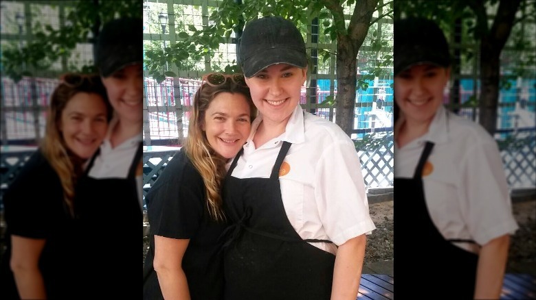 Drew Barrymore in Cronut line with employee