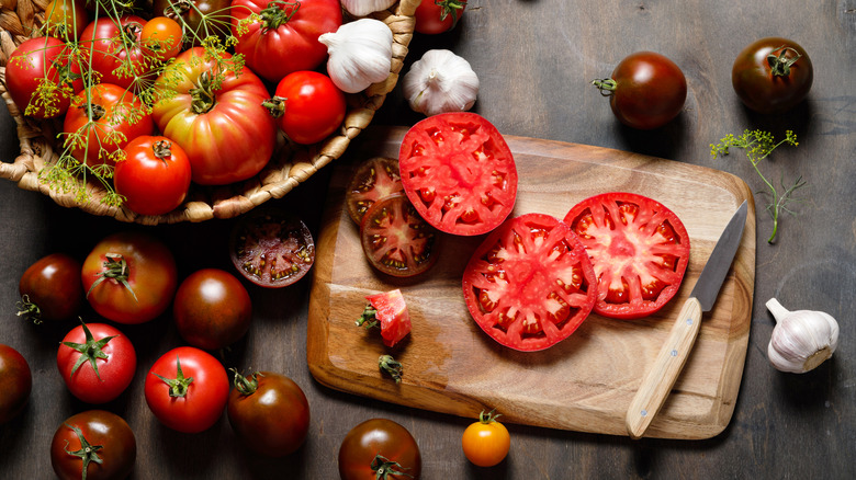 tomatoes on cutting board
