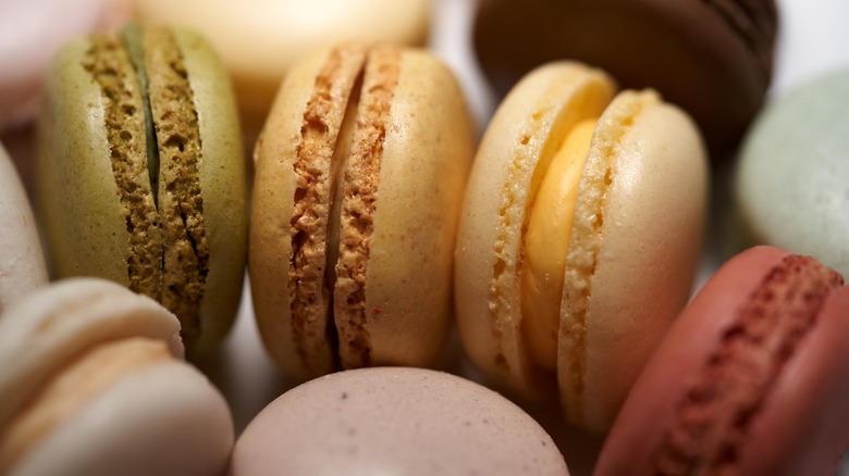 Close-up of various macarons showing their feet