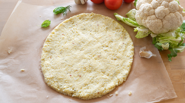 Unbaked cauliflower pizza crust