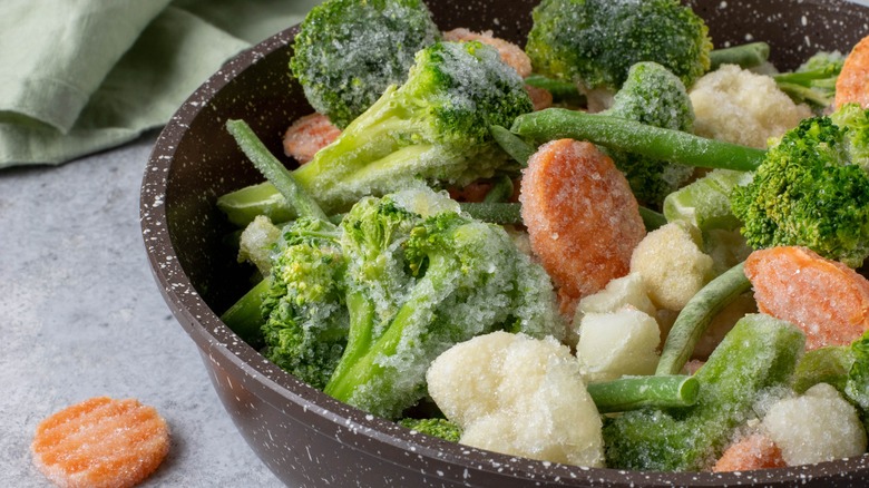 frozen mixed vegeetables in a skillet