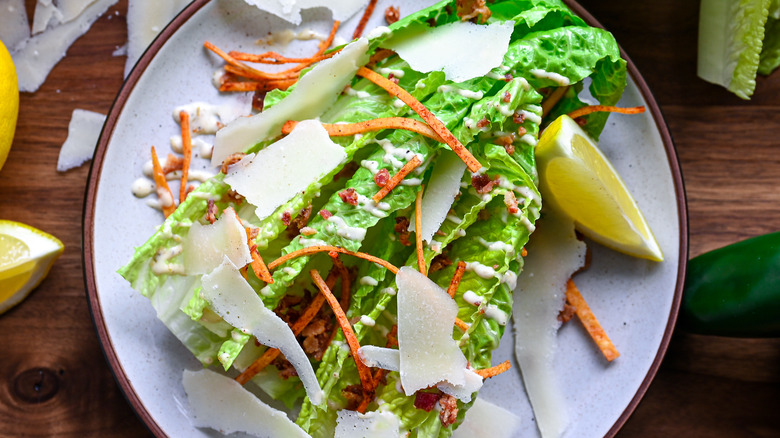 Caesar salad topped with tortilla chips