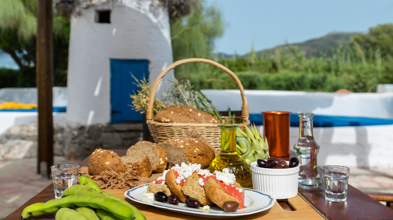 Olive, cheese, and bread dish from Crete on table