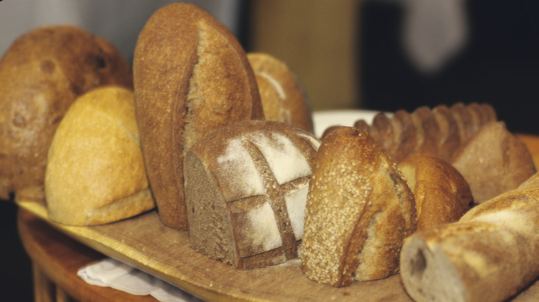 cut bread loaves on board