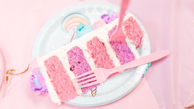 cake slice with pink and purple layers