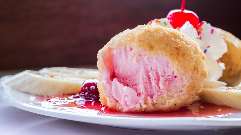 Strawberry fried ice cream ball sliced