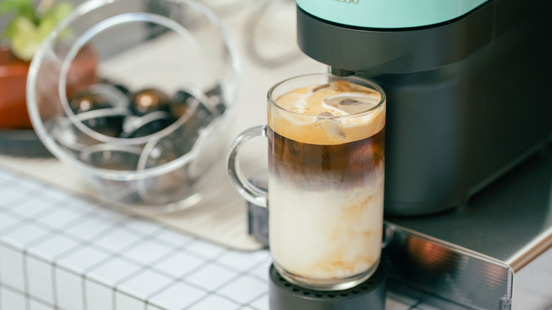 Nespresso machine brewing coffee