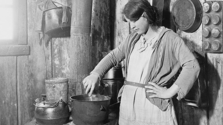 woman cooking during great depression