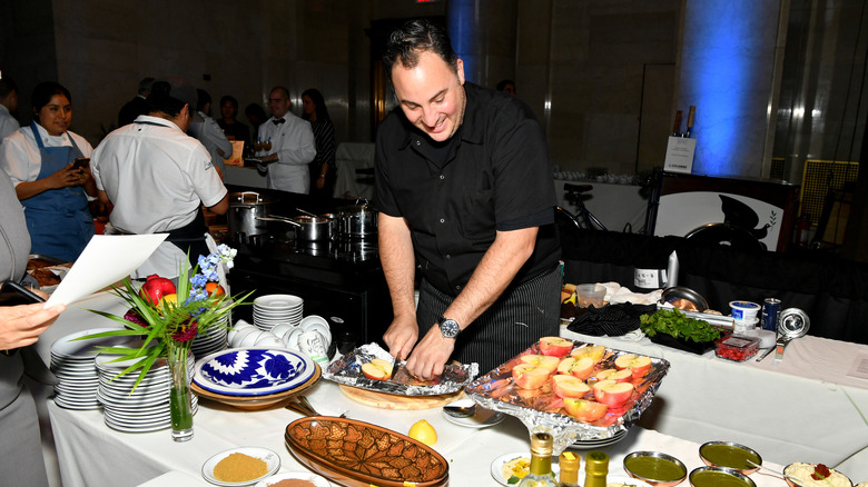 Michael Ginor slices food