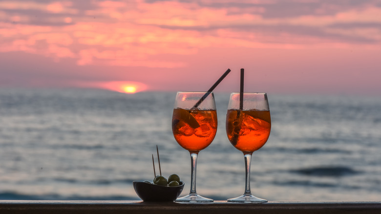 Two Campari cocktails at sunset