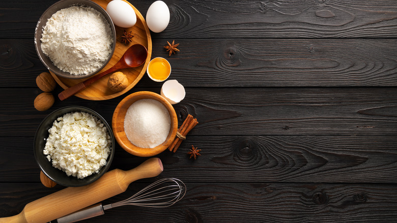 ingredients for baking on dark background