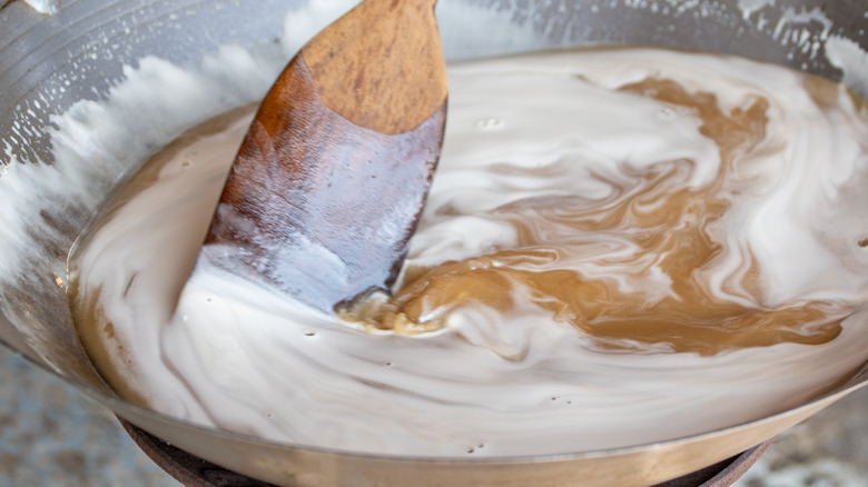 cream of coconut stirred in bowl