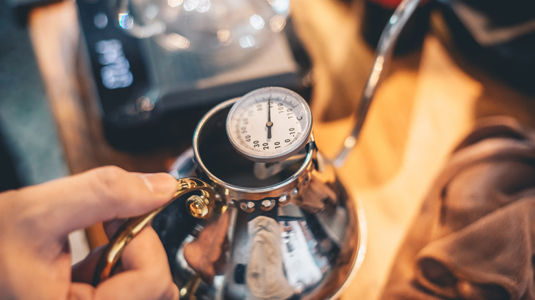 water temperature on barista's pot