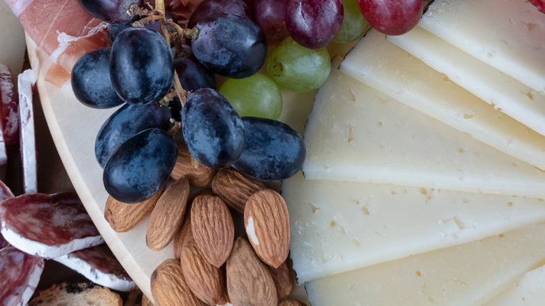 Cheeseboard with Manchego and grapes