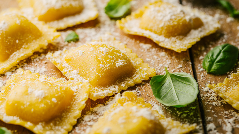 ravioli on wooden board