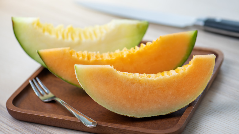 Orange and green honeydew melon