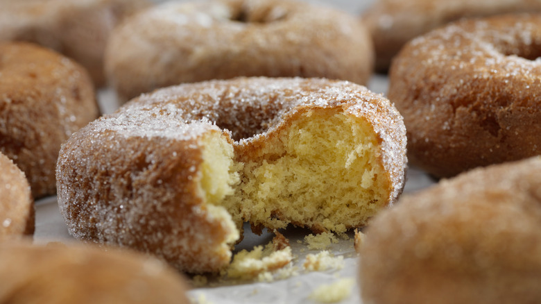 Cake donut with a bite out of it 