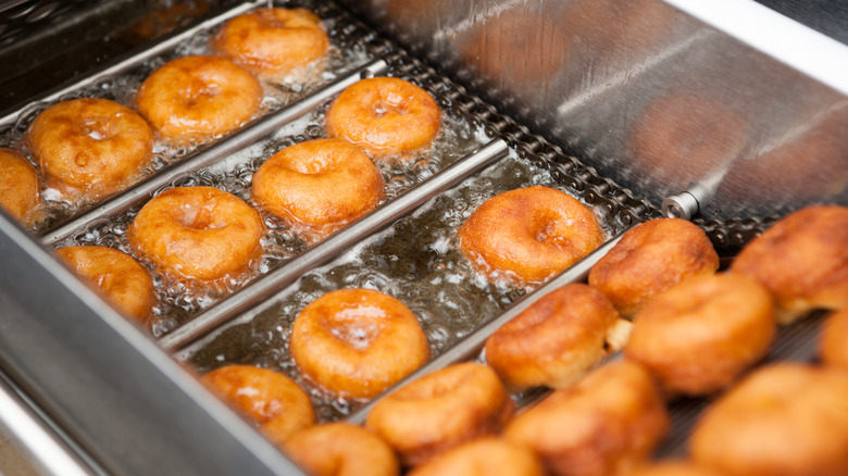 commercial kitchen frying donuts 