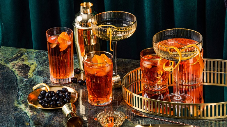 Assortment of whiskey-based cocktails fashionably arranged