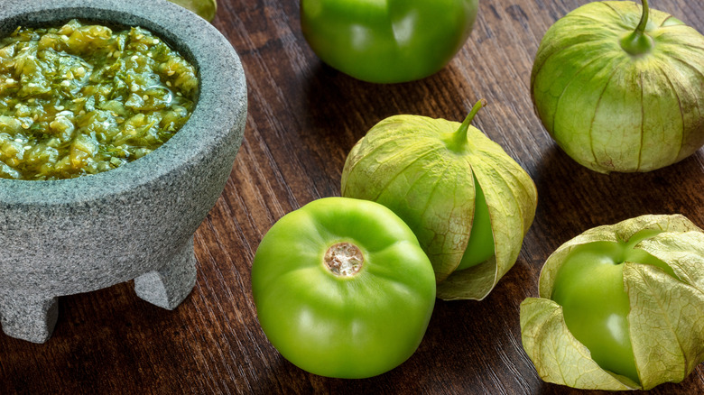 tomatillos with husks and salsa verde