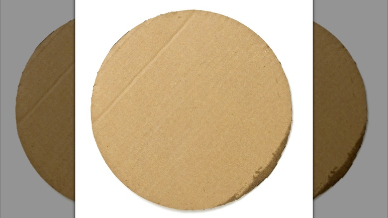 Cardboard round on white background