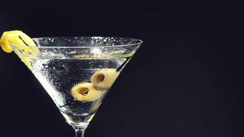 martini with olive and lemon twist