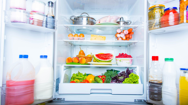 open refrigerator filled with food