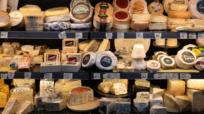 many cheeses in store display