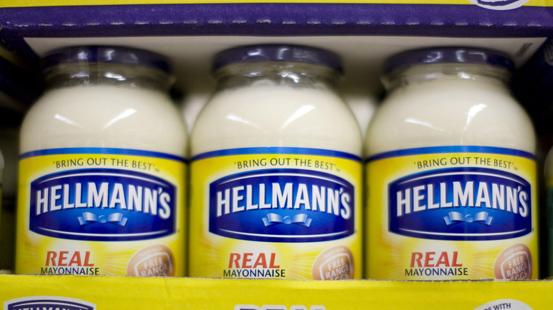 Grocery store display of Hellmann's mayonnaise jars