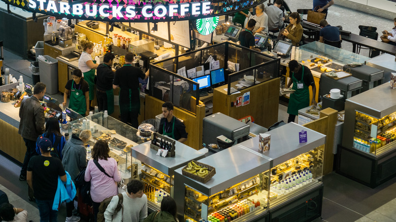 busy group of Starbucks baristas 