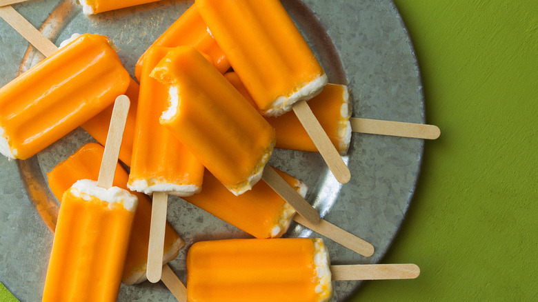 orange creamsicle popsicles on plate