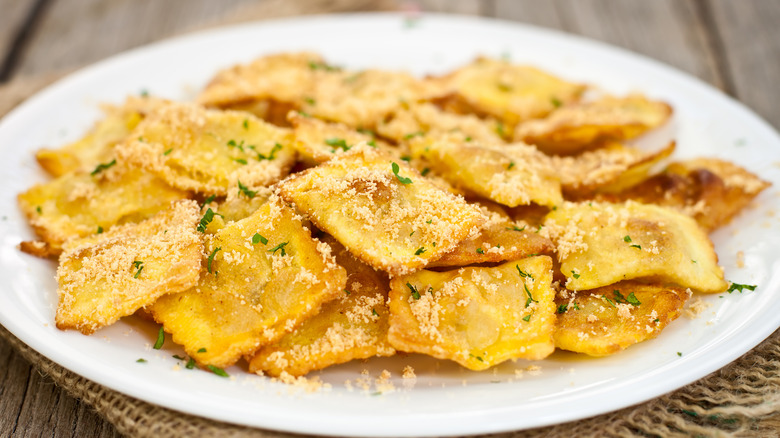 Fried ravioli with parmesan and herbs