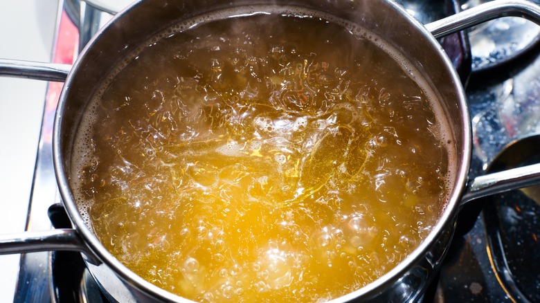 Broth boiling in pan