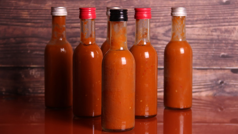 bottles of sauce on table