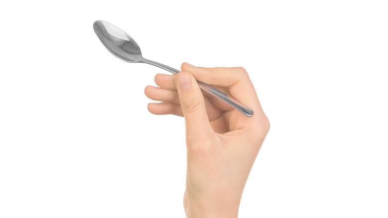 Silver spoons, forks, and butter knife