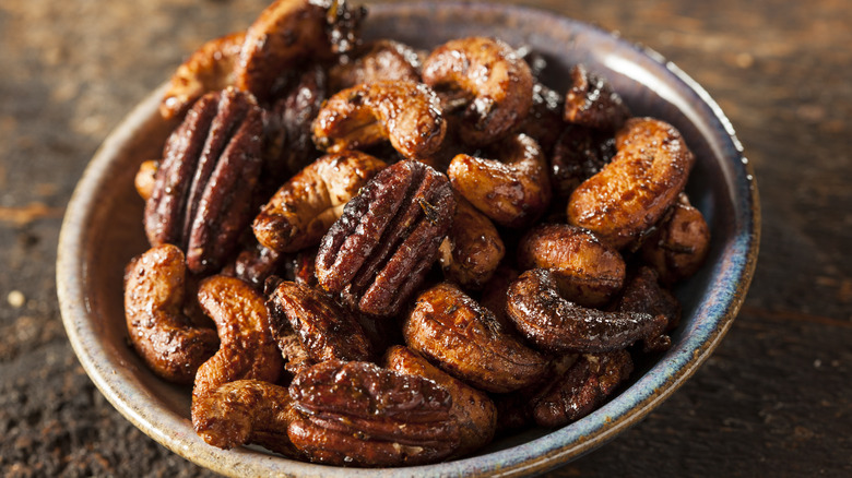 Candied nuts in ceramic bowl