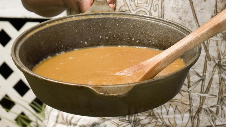 Spoon in a pan of gravy