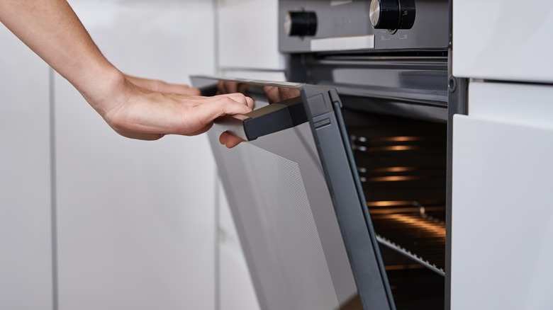 opening oven door